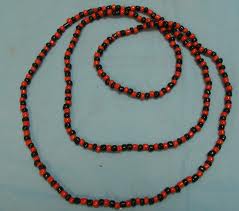 A necklace with black and red beads